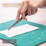 Dao rọc giấy dọc giấy inox DELI 2034 E2034 2054 2031 2061 dao hãng HAND SK5 lưỡi dao bạc, dao đen 30 độ cắt chi tiết - Image 2