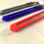 Dao rọc giấy dọc giấy inox DELI 2034 E2034 2054 2031 2061 dao hãng HAND SK5 lưỡi dao bạc, dao đen 30 độ cắt chi tiết - Image 8